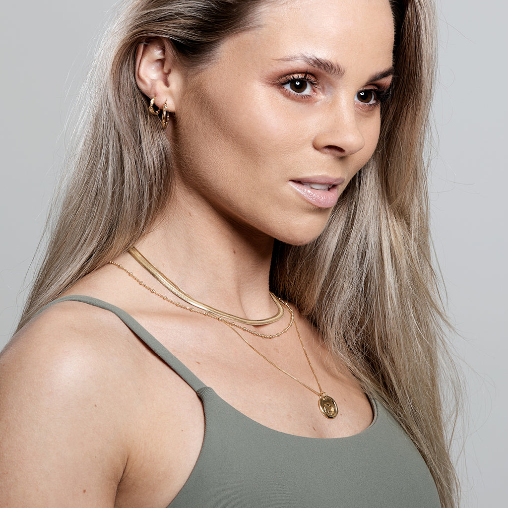 SIGN Hughrif gylltir silfureyrnalokkar 20mm