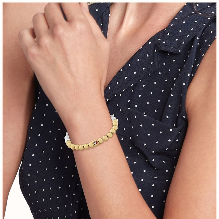 TOMMY HILFIGER hvítt og gyllt kúluarmband