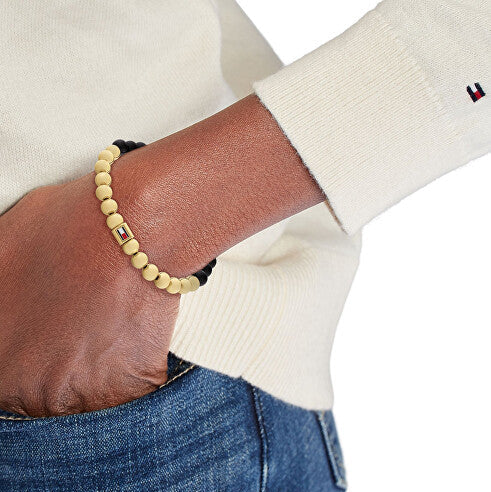 TOMMY HILFIGER svart og gyllt kúluarmband