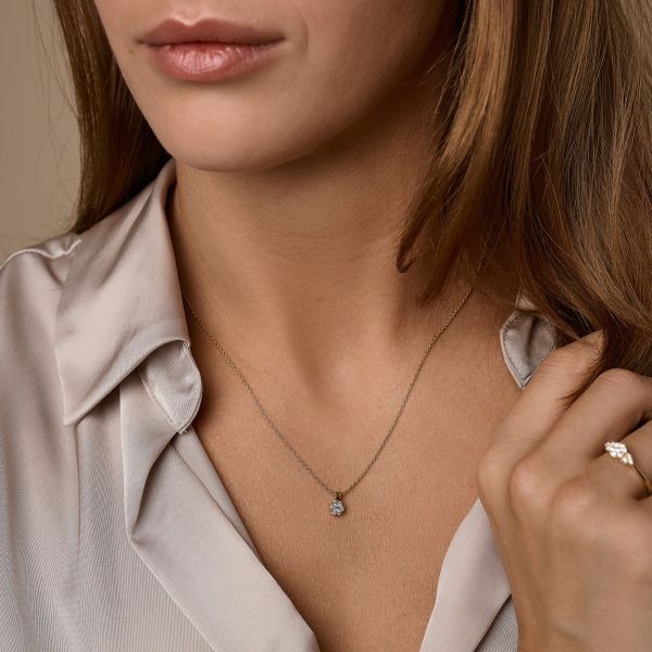 Lilja gullhálsmen 14kt með 0.14ct demöntum