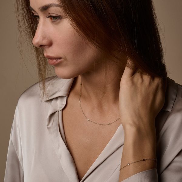 Zoe gullarmband 14kt með 5x 0.025ct demöntum